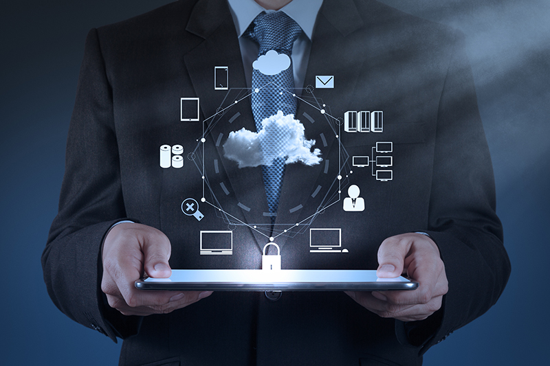 Businessman working with a Cloud Computing enabled tablet.